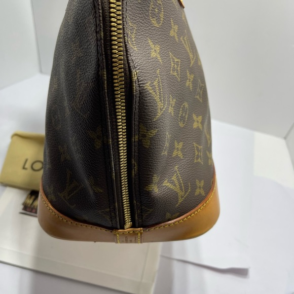 Loui Vuitton Alma in Monogram, with dust bag. - Picture 5 of 16